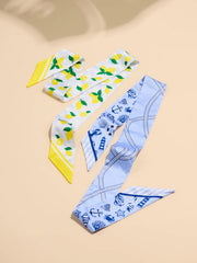 Pair Of Coastal Citrus Twilly Scarves by Shiraleah