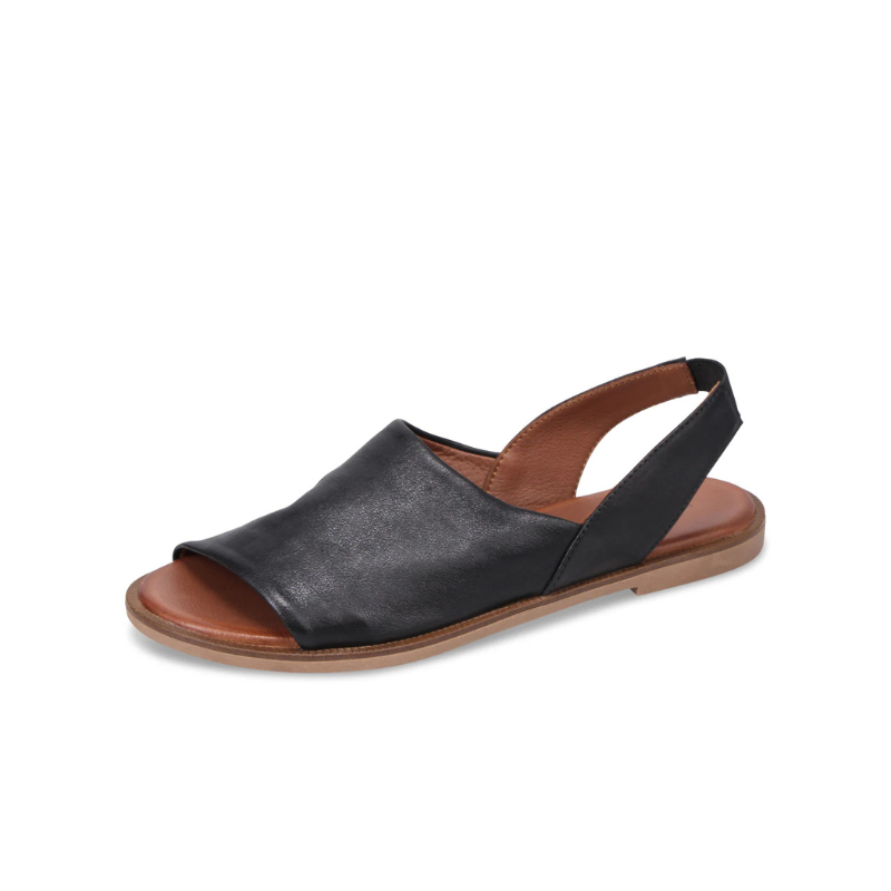 Black sandal with brown sole on a white background