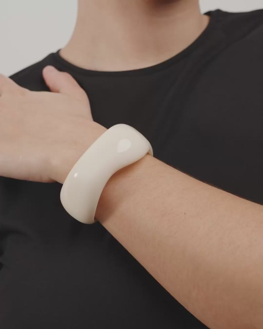 Load video: Aase Maxi Bangle in Ivory by Pilgrim