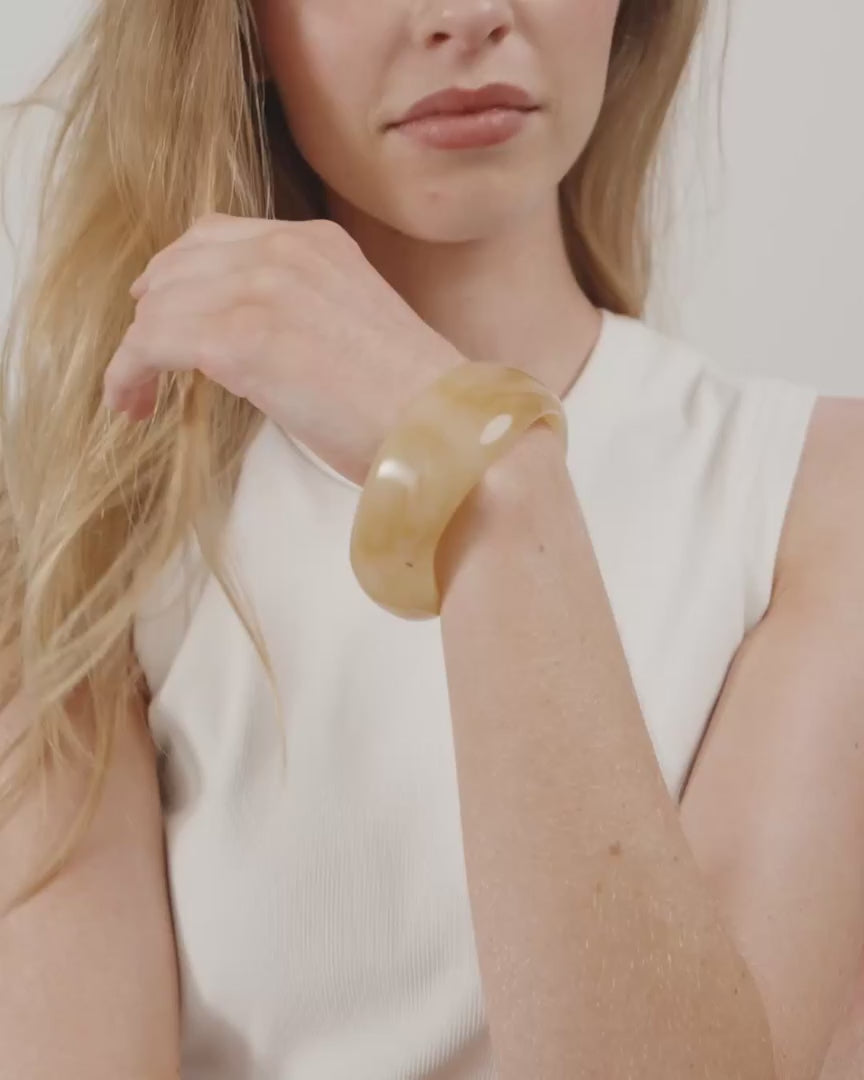 Load video: Aase Maxi Waterproof Bangle in Honey by Pilgrim