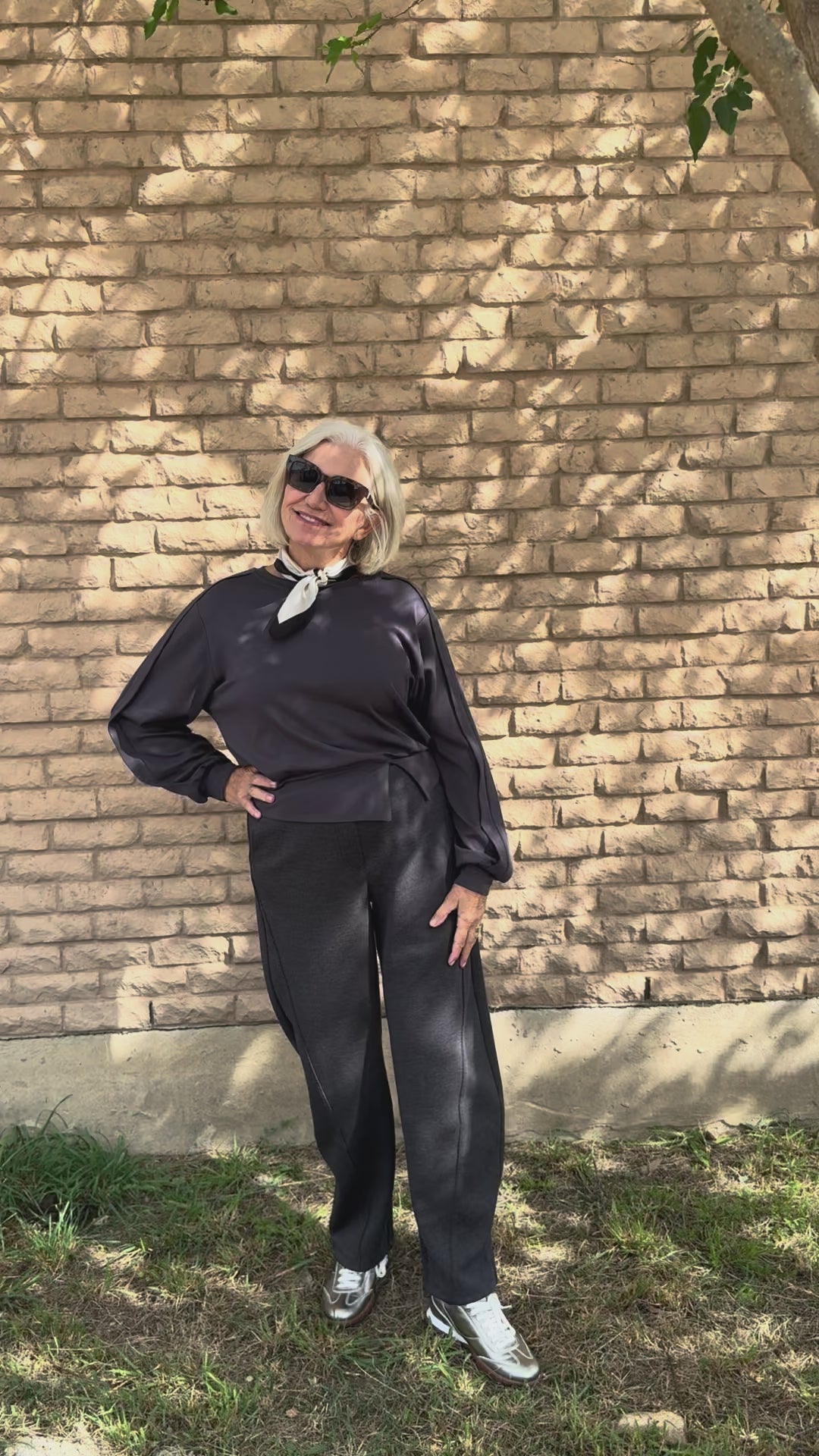 Load video: Jersey Loose Fit Barrel Trousers in Black Melange by YAYA